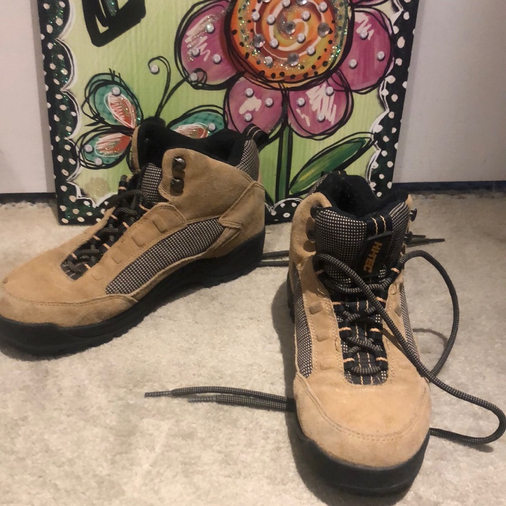 Hiking boots only worn a few times one summer for a hiking trip. Size 8 1/2